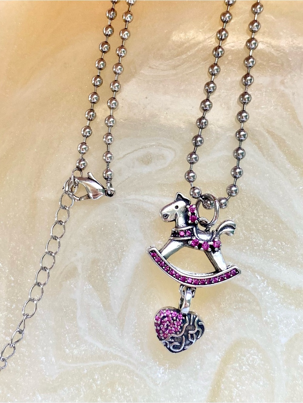 Silver Rocking Horse Pendant Necklace with Pink Crystal Accents